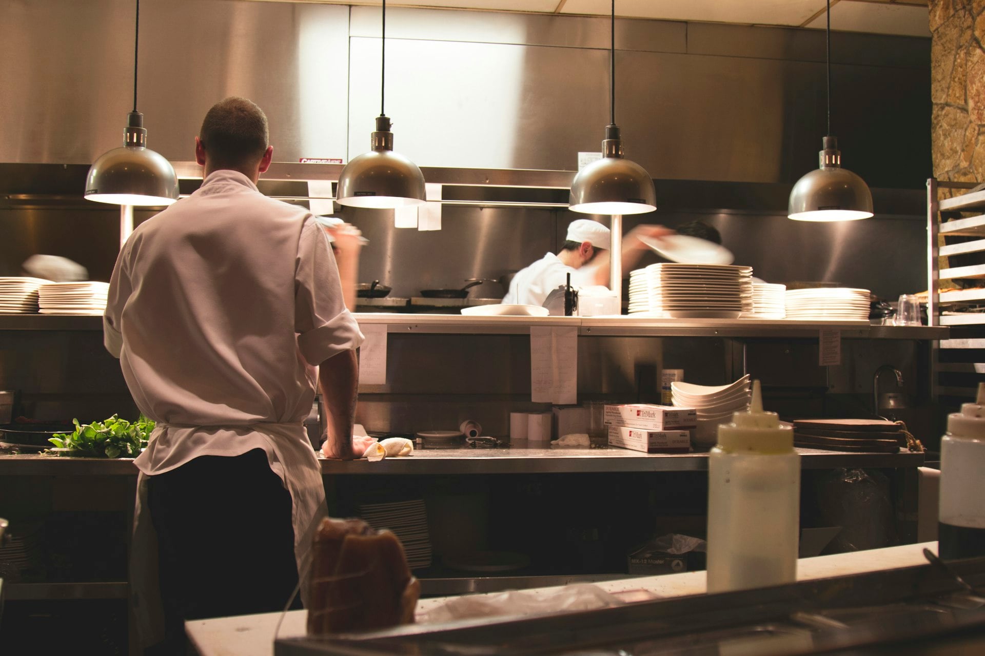 Chefs working on the line in a professional kitchen
